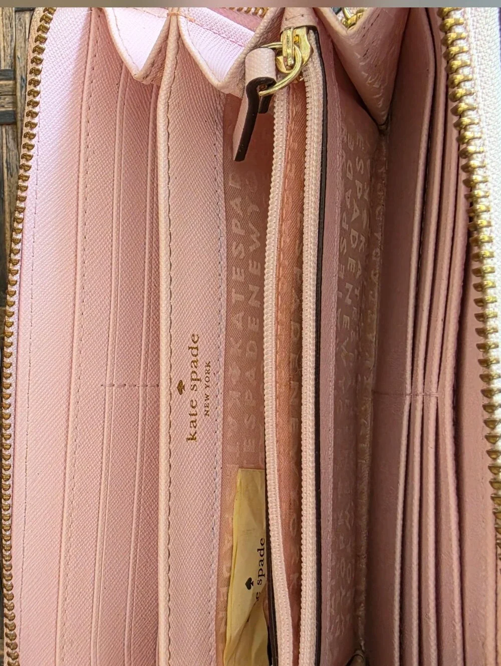 kate spade Pale Pink Zip-Around Leather Wallet with Gold Hardware